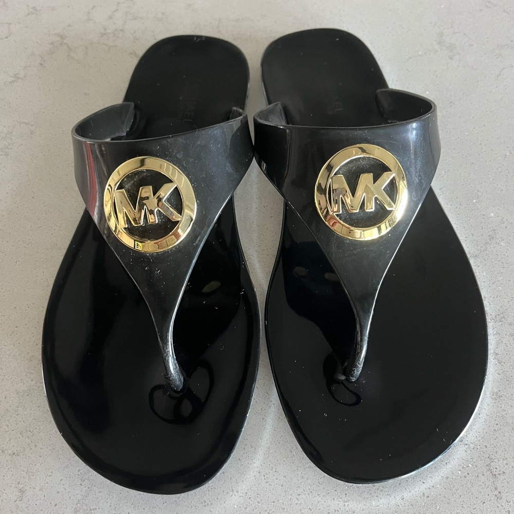 Michael Kors Lillie Black jelly thongs.